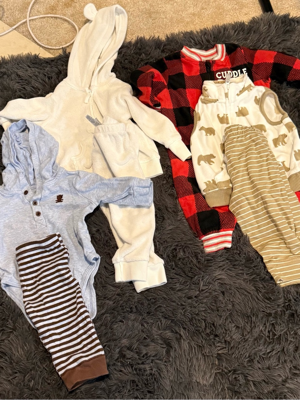 Bundle of 3 matching sets and a flannel onesie
